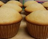 A picture of step 5 of Vanilla cake with coffee butter cream frosting.