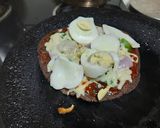 A picture of step 4 of Ragi flour pizza.