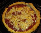 A picture of step 7 of Best deep dish pan pizza.