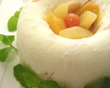 A picture of step 5 of Fruit-Packed Yogurt Ice Cream Cake.