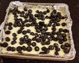 A picture of step 14 of Blueberry Lemon Cheesecake Bars.