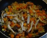 A picture of step 2 of Butter Soy Sauce Pilaf with Roast Chicken and Shimeji Mushrooms.