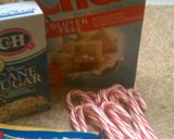 A picture of step 1 of Peppermint Bark Muddy Buddies.