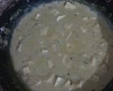 A picture of step 3 of Nawabi paneer korma with white gravy.