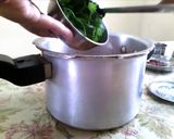 A picture of step 3 of Healthy Mooligai Mudakathan Thoothuvalai Keerai Masiyal - calcium rich.