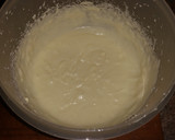A picture of step 15 of Cinnamon Roll Poke Cake.