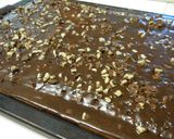 A picture of step 9 of Grandma's Minty Texas Sheet Cake.