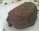 A picture of step 4 of Chocolate bisquits with cookie press machine.