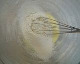 A picture of step 4 of Use Up Egg Whites! Baked White Doughnuts!.