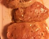 A picture of step 4 of Bacon wrapped stuffed Pork chops.