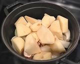 A picture of step 12 of Waterless Nikujaga (Simmered Meat and Potatoes) in a Staub Cocotte.