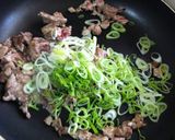 A picture of step 2 of Leek, Pork, and Miso Fried Rice.
