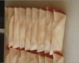 A picture of step 4 of Pan-fried Gyoza with Rolled Ham and Cheese.