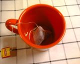 A picture of step 1 of Easy Rich Milk Tea in a Microwave.