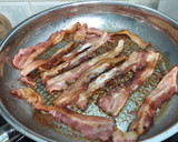 A picture of step 1 of Bacon And Onion In BBQ Sauce Open Sandwich.