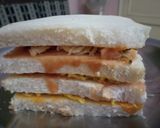 A picture of step 10 of Peri Patakha Chicken Sandwich Cake.