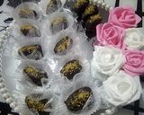 صورة لخطوة 8 من وصفة تمر محشي بتوفيا كراميل وحبات اللوز والجوز ❤❤❤