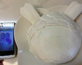 A picture of step 8 of Rabbit Hello Kitty Cake.