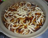A picture of step 6 of Piping Hot Udon Noodle Hot Pot.