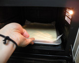 A picture of step 13 of Italian Roll Cake.