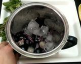 A picture of step 1 of Black plum smoothie.