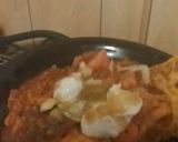 A picture of step 9 of Smothered Chimichanga Casserole.