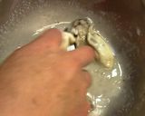 A picture of step 2 of How to Prepare Oysters.