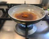 Foto del paso 2 de la receta: Aliño de ají de color para legumbres