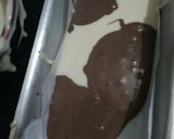 A picture of step 8 of Tahini Chocolate Cake with Coconut Chocolate Mousse frosting.