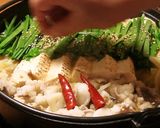 A picture of step 8 of Miso Motsu Nabe (Hakata Specialty).