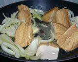 A picture of step 1 of Tofu And Onion In Whole Grain Mustard Sauce.