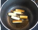 A picture of step 2 of Warm Your Body! Seared Japanese Leek and Ginger Soup.