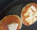 A picture of step 6 of Mini pan pizzas.