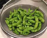 A picture of step 2 of Edamame in a Cast Iron Pot..