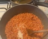 Foto del passaggio 6 della ricetta Risotto al pomodoro con riduzione di basilico 🌿