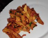 A picture of step 5 of Masala fries/ chips.
