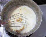 A picture of step 6 of Melt-in-Your-Mouth Pumpkin Custard Pudding.