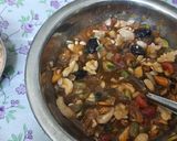 A picture of step 5 of Christmas special eggless plum cake.