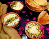 A picture of step 7 of Kheer Puri.