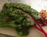 A picture of step 1 of Sautéed Chard with Walnuts & Dried Fruit.