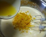 A picture of step 7 of Fluffy Madeleines with Orange Peels.