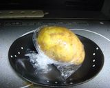 A picture of step 5 of New Potatoes and Pork with Rich Butter Soy Sauce.