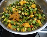 A picture of step 3 of Aalu bhindi.
