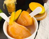 A picture of step 3 of Mango popsicles.