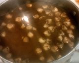 A picture of step 5 of Chicken Marsala.