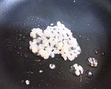 A picture of step 2 of Colourful Garlic Rice.