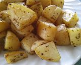 A picture of step 5 of Garlic and Herb Roasted Potatoes.