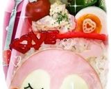 A picture of step 4 of Charaben Stick Ham on Rice Dokin-chan.
