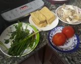 Hình bước làm 1 của món Đậu hũ kho nấm cà chua 🍅