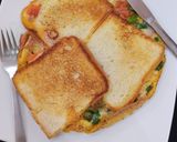 A picture of step 5 of Bread sliced cheese omelette.
